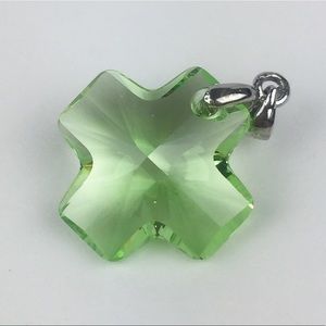 Green Crystal cross pendant, adds sparkle to faith